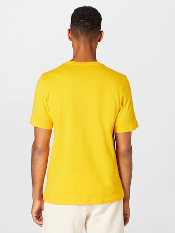 geltona ADIDAS ORIGINALS Marškinėliai 'Adicolor Classics Trefoil'