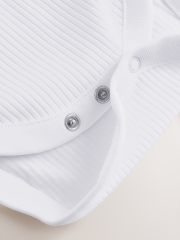 Set de la Next pe roz