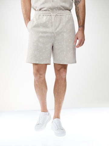 ABOUT YOU x Kevin Trapp Regular Pants 'Quentin' in Beige: front