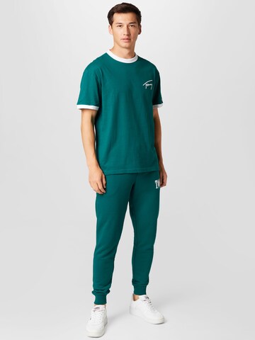 Tommy Jeans Zúžený strih Nohavice - Zelená