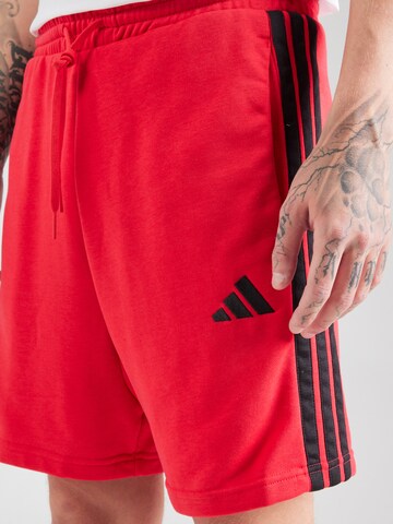 ADIDAS SPORTSWEAR Regular Sports trousers in Red