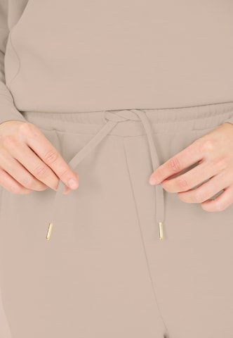 Athlecia Regular Sporthose 'Jacey' in Braun