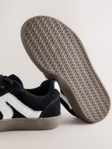 Baskets Next en noir