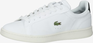 Baskets basses LACOSTE en blanc : devant