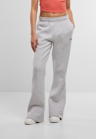 Karl Kani Flared Trousers in Grey: front