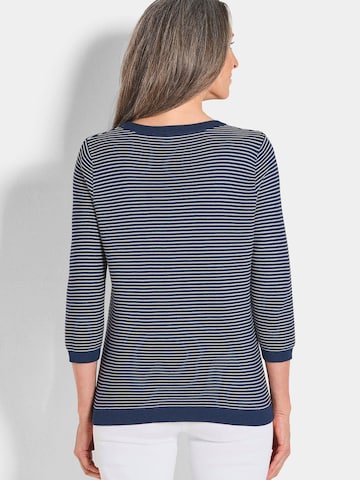 Goldner Pullover in Blau