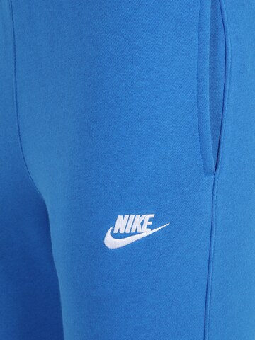 Nike Sportswear Tapered Broek 'Club Fleece' in Blauw