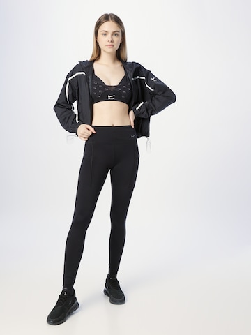 Skinny Pantaloni sportivi di NIKE in nero