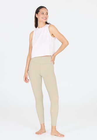 Athlecia Skinny Sports trousers 'FRANZ' in Brown