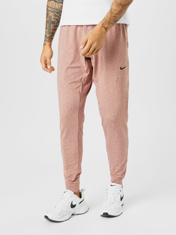 NIKE Tapered Sporthose in Pink: predná strana