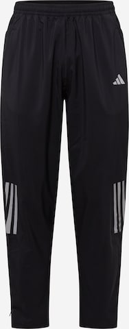 ADIDAS PERFORMANCE Tapered Sports trousers 'Own The Run Astro' in Black: front