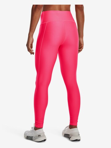 Skinny Pantaloni sportivi di UNDER ARMOUR in rosa