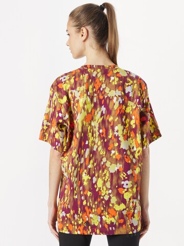 ADIDAS BY STELLA MCCARTNEY - Camisa funcionais 'Graphic' em laranja