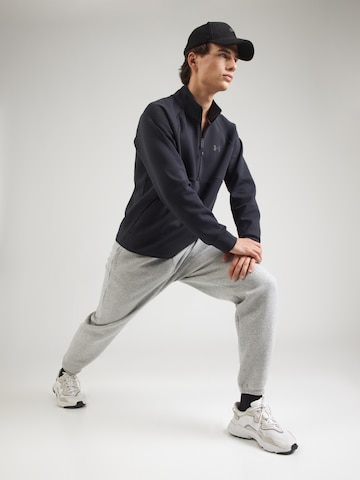 UNDER ARMOUR Sportsweatshirt 'Unstoppable' in Zwart