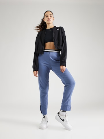 NIKE Tapered Sportbroek in Blauw