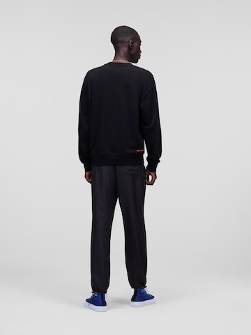 Karl LagerfeldSweater majica 'Athleisure Logo' - crna boja