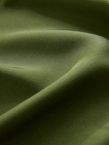 Next Pusero värissä vihreä