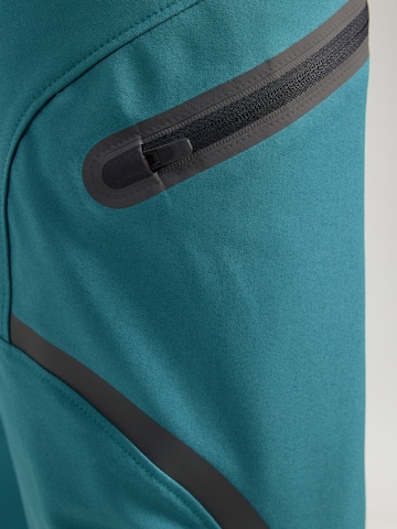 UNDER ARMOUR - regular Pantalón deportivo 'Unstoppable' en verde