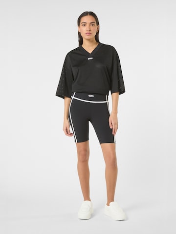 FILA - Slimfit Pantalón 'CONFINI slim contrast tape shorts' en negro