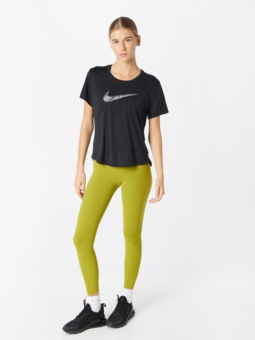 NIKE Skinny Spodnie sportowe 'ZENVY' w kolorze zielony