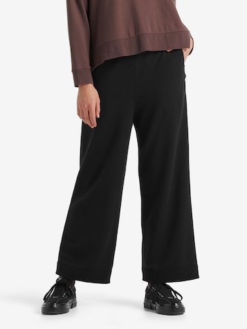 Wide Leg Pantalon de sport 'Dalston' ICEBREAKER en noir : devant