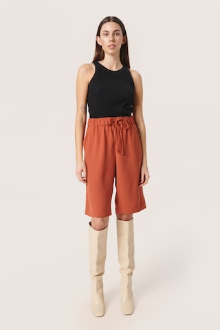 SOAKED IN LUXURY Loose fit Trousers 'Shirley' in Orange