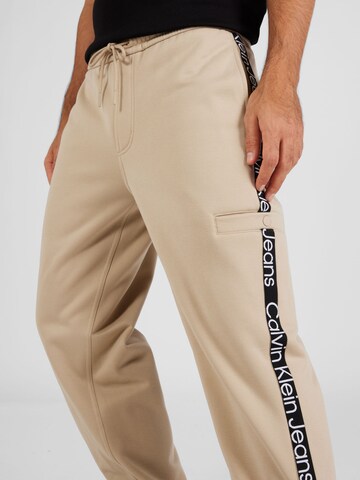 Calvin Klein Jeans Loose fit Pants in Beige