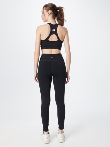 SKECHERS Skinny Workout Pants in Black