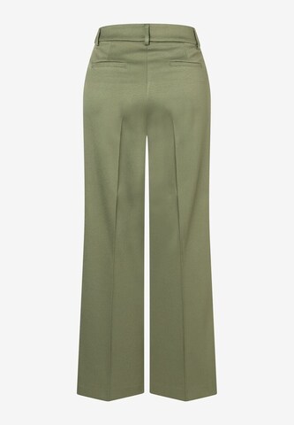 Wide leg Pantaloni con piega frontale di MORE & MORE in verde
