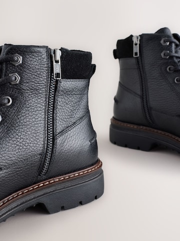 Next - Botas con cordones en negro