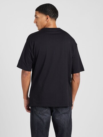 NEW ERA - Camiseta 'TEAM' en negro