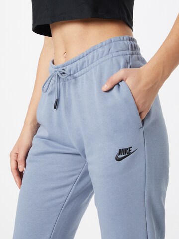 Nike Sportswear Tapered Sportbroek 'Emea' in Blauw