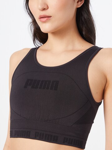 PUMA قطعة علوية رياضية بلون أسود