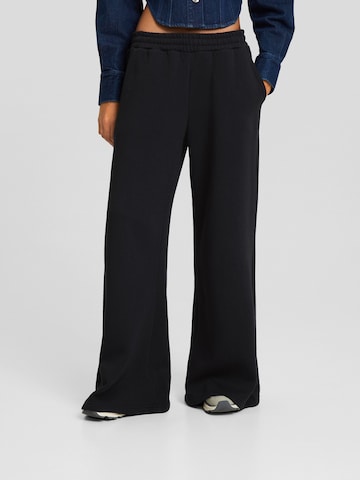 Bershka Wide leg Pants in Black: front