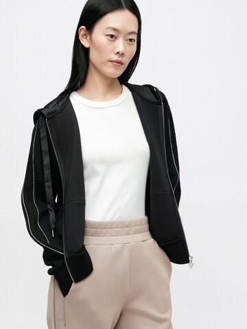 GUESS Sweatjacke in Schwarz