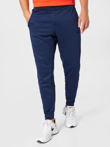 NIKE Конический (Tapered) Спортивные штаны в Синий: спереди