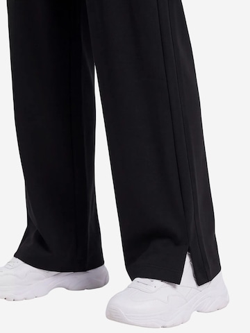 Wide leg Pantaloni 'Hose' di Tommy Life in nero
