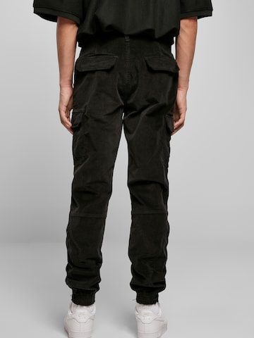 Loosefit Pantaloni cargo di Urban Classics in nero