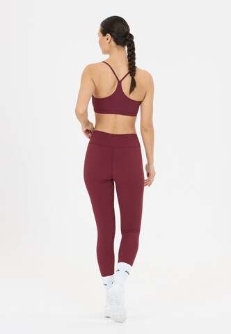 Athlecia Skinny Workout Pants 'Blossom' in Red