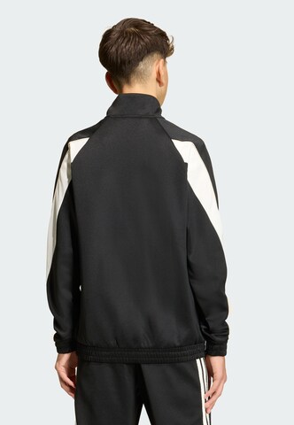 ADIDAS SPORTSWEAR - Chaqueta deportiva 'Stadium' en negro