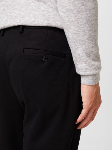 Tapered Pantaloni de la BURTON MENSWEAR LONDON pe negru