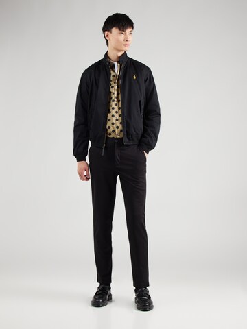 Lindbergh Slimfit Hose 'Superflex' in Schwarz