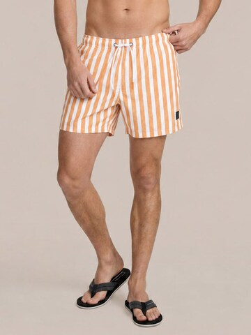Suitable Board Shorts in Orange: front
