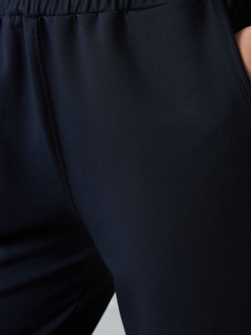 Effilé Pantalon Tommy Life en bleu