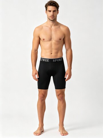 MEETWEE Slimfit Sportbroek in Zwart: voorkant