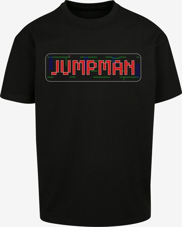 F4NT4STIC Shirt 'Jumpman C64 Retro Gaming SEVENSQUARED' in Zwart: voorkant