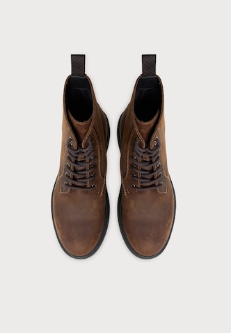 BOSS - Botas con cordones 'Ferling' en marrón: arriba