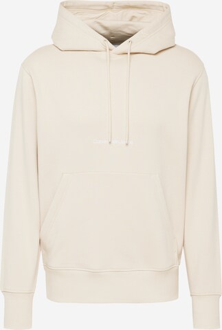 Sweat-shirt Calvin Klein Jeans en beige : devant