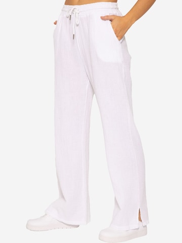 SASSYCLASSY Loose fit Trousers in White: front