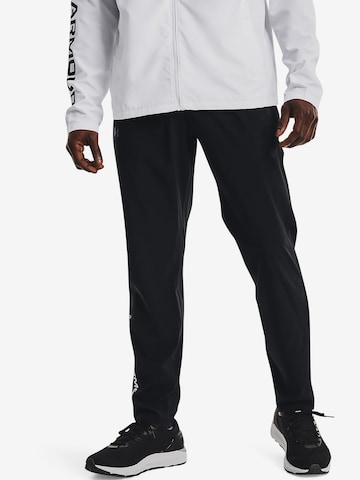 UNDER ARMOUR Regular Sports trousers 'Storm Run' in Black: front